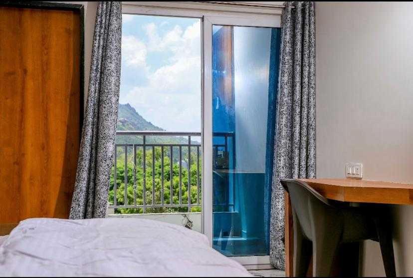 Super Townhouse Ambaji Formerly Hotel Kardhar Inn מראה חיצוני תמונה
